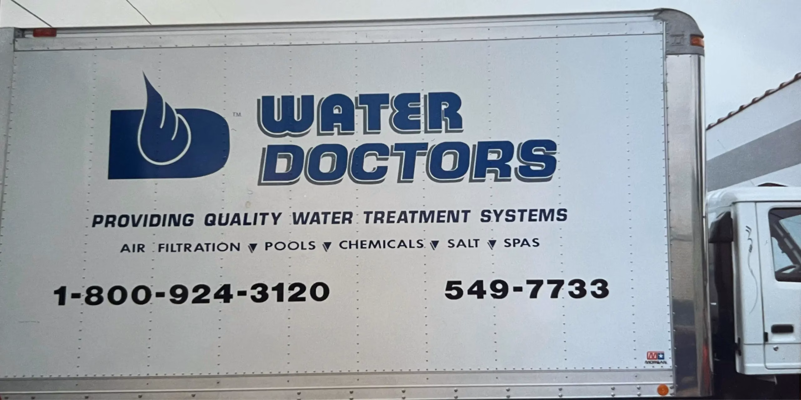 Light Truck with Water Doctors logo on side