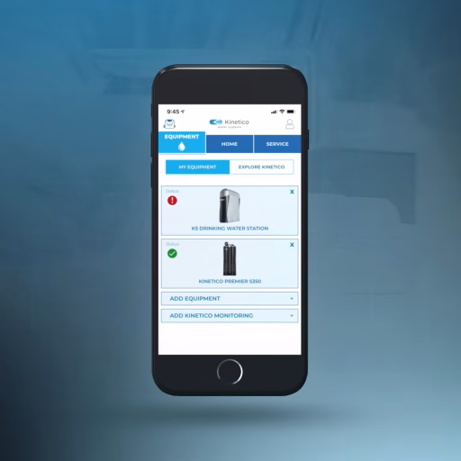 Smartphone showing the Kinetico water softener app with time sync and tank status