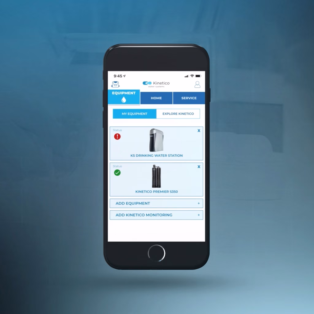 Smartphone showing the Kinetico water softener app with time sync and tank status